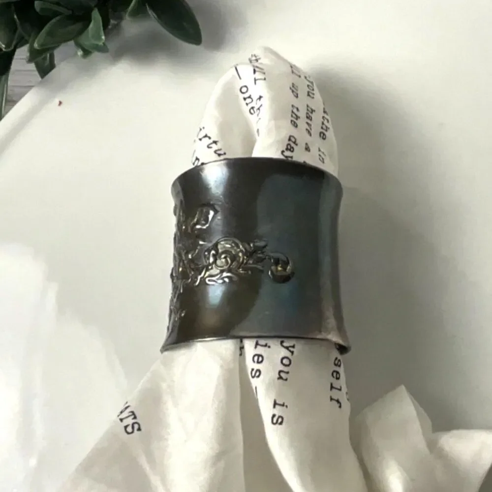 Gorgeous antique silver plated napkin ring; embossed flowers